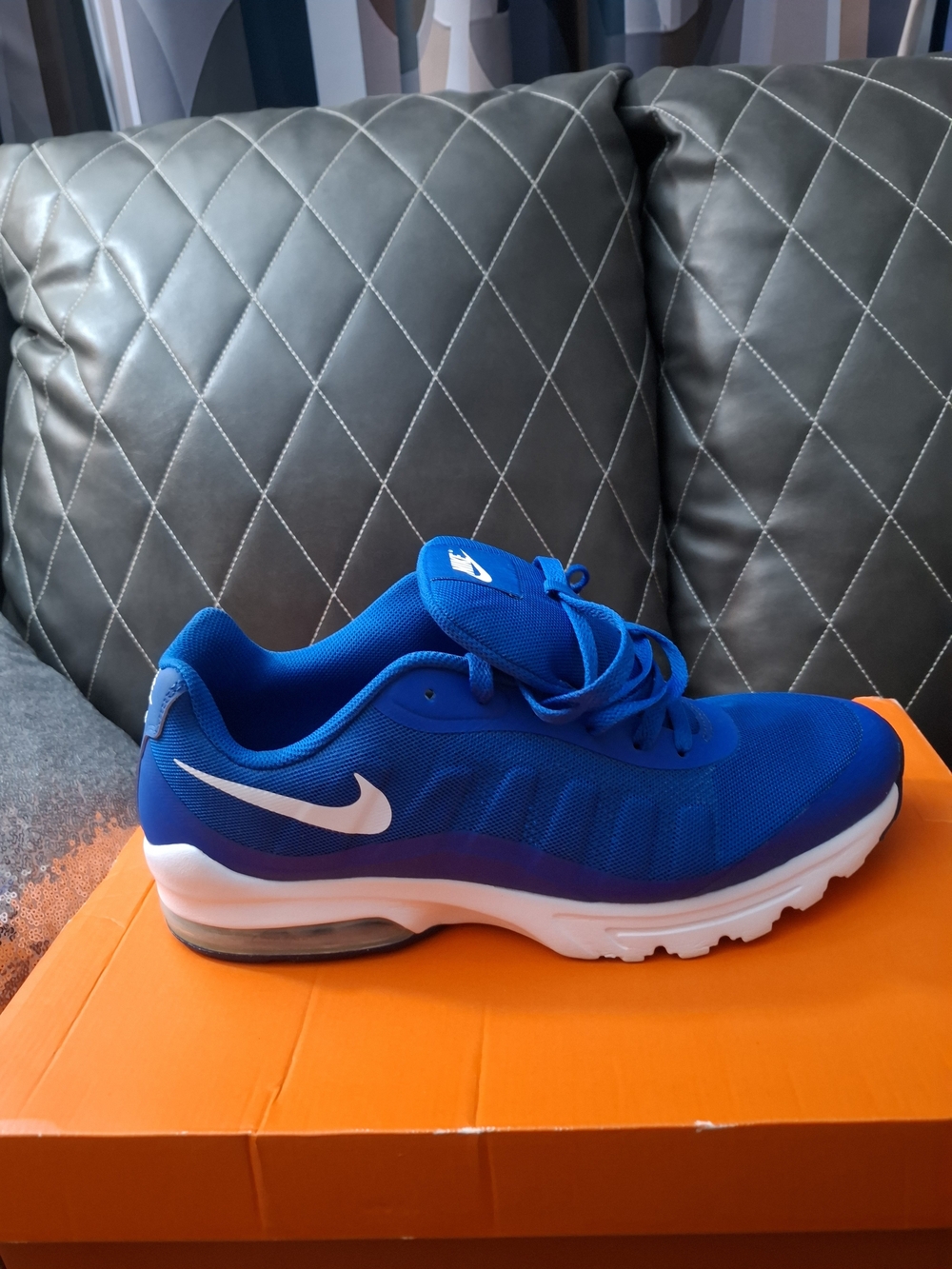 Nike Men’s Blue Athletic Running Shoes with White Swoosh